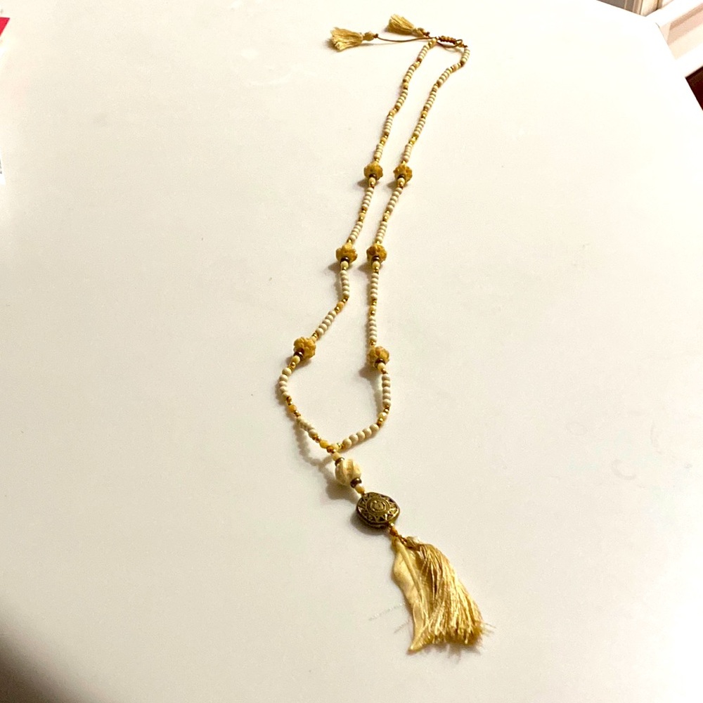 Long Beaded necklace with Tassel and feather charm